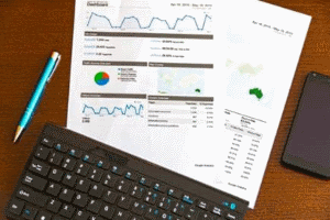 picture of keyboard and paper showing charts